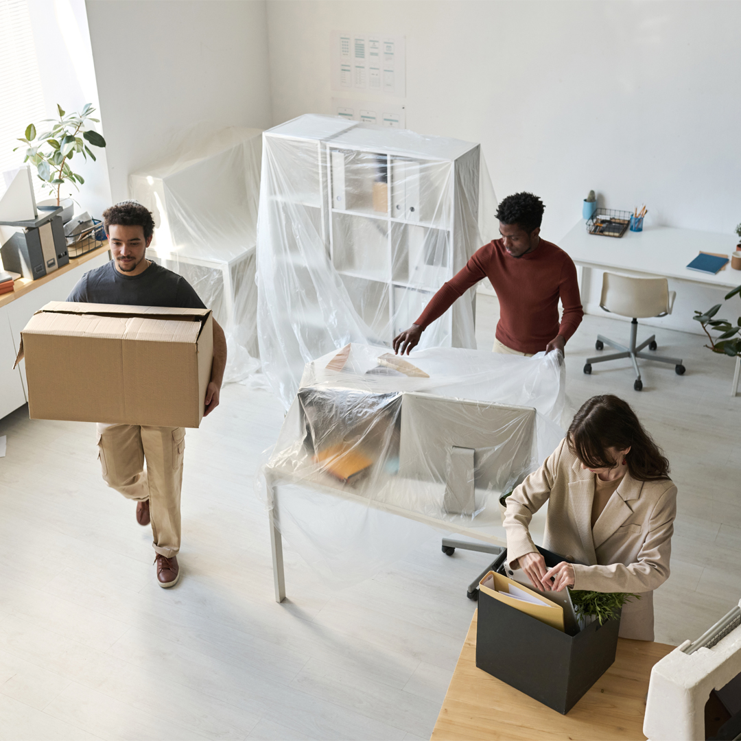 Professional movers and packers in Dubai assisting with an office relocation.